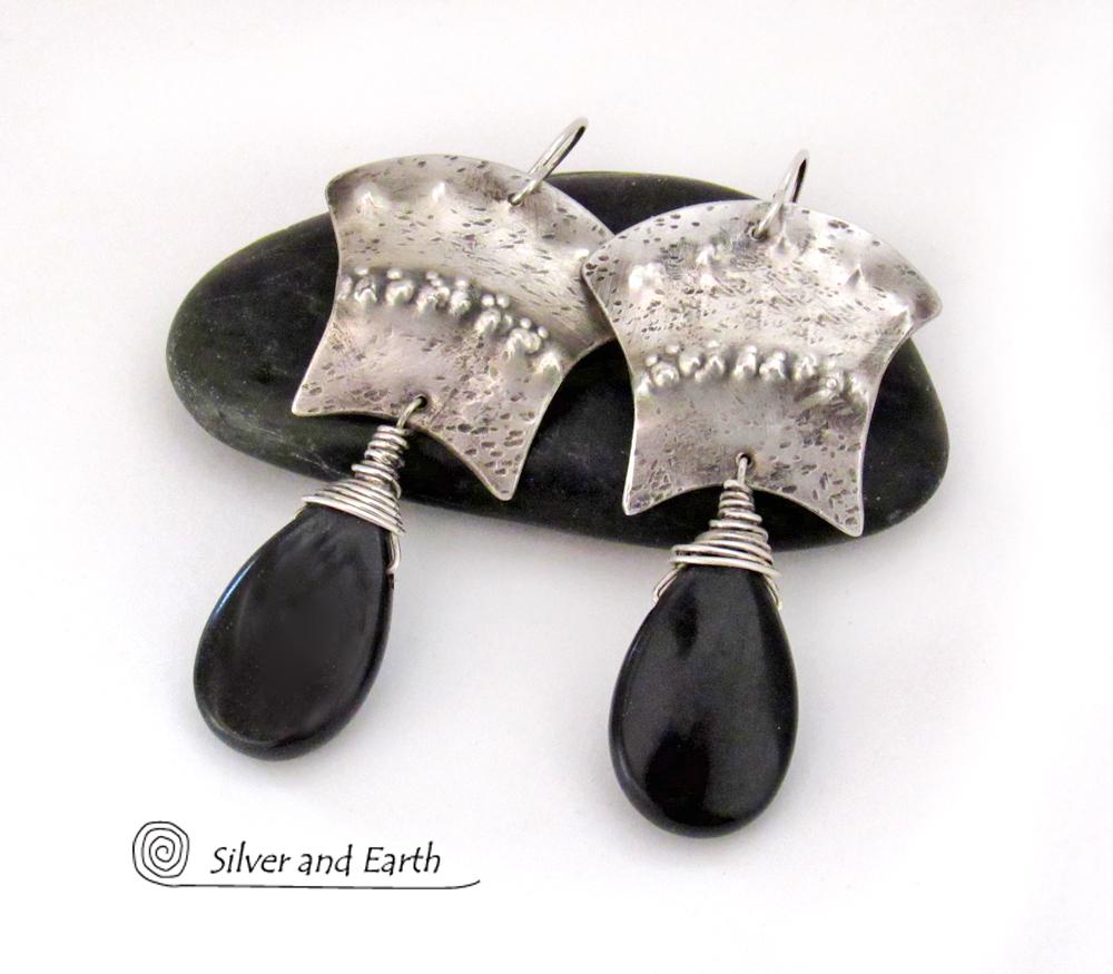 Artisan good silver and onyx earrings.